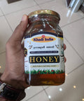 GramasreeHoney500g_front_hand