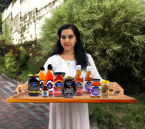 Girl Holding Honey Collections