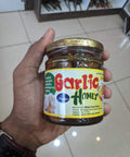 GarlicHoney250g_front_hand